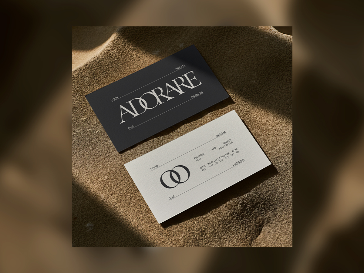 Adorare wedding decoration brand business cards with minimalist design on textured surface