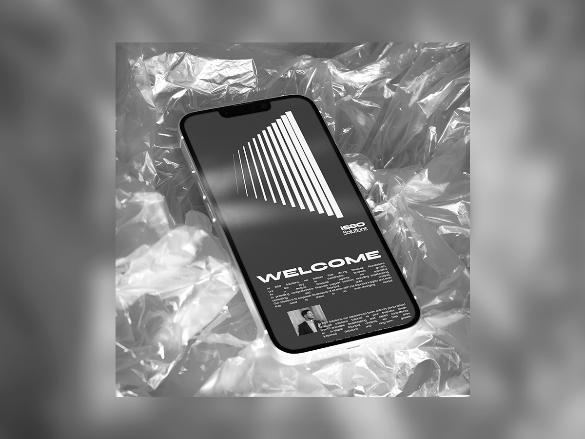 ISSO Solutions corporate website welcome page displayed on iPhone mobile mockup with modern black and white design