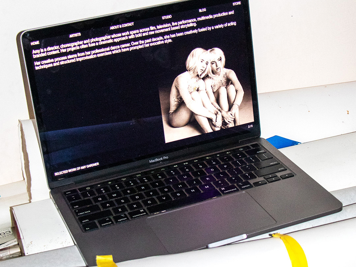 Think Very Little creative agency portfolio website design for artist Amy Gardner displayed on MacBook Pro screen